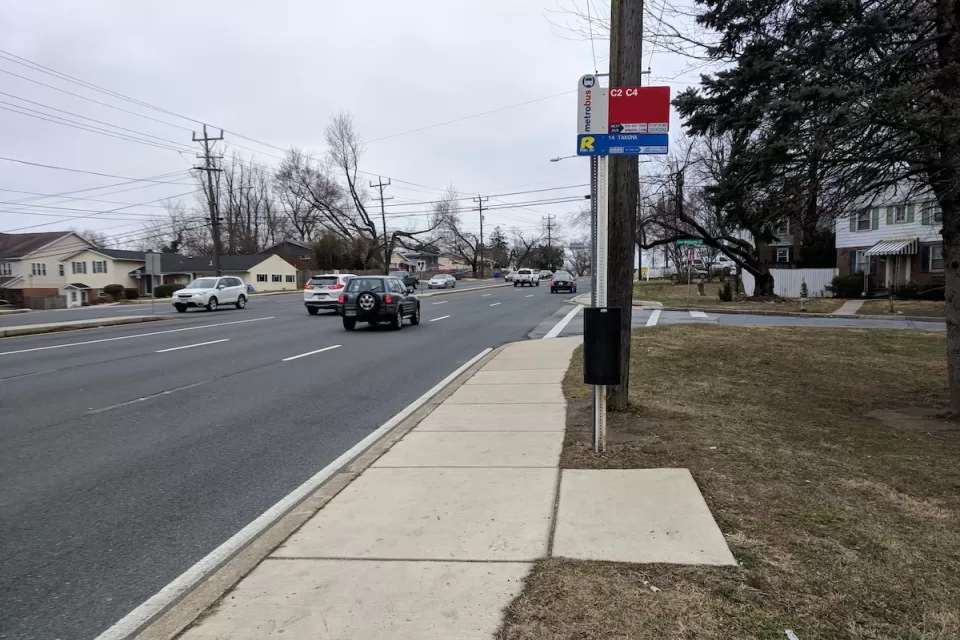 WMATA bus stop with sign and no bench or shelter in Washington, D.C.